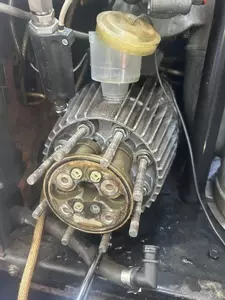 Before refurbishment of the C3 pump head during servicing work on a heavily used Nilfisk Neptune 7. The pump was stripped down for inspection after prolonged heavy use, allowing worn internal components, valves, and seals to be checked before rebuilding.